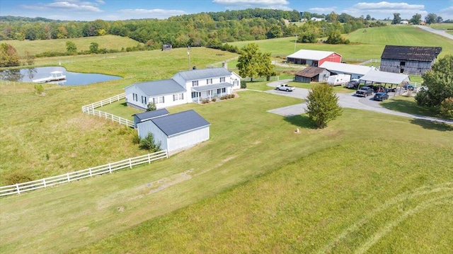 aerial view featuring a rural view and a water view