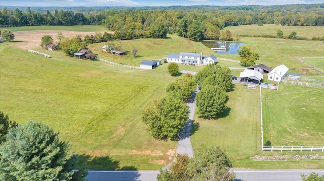 birds eye view of property with a rural view