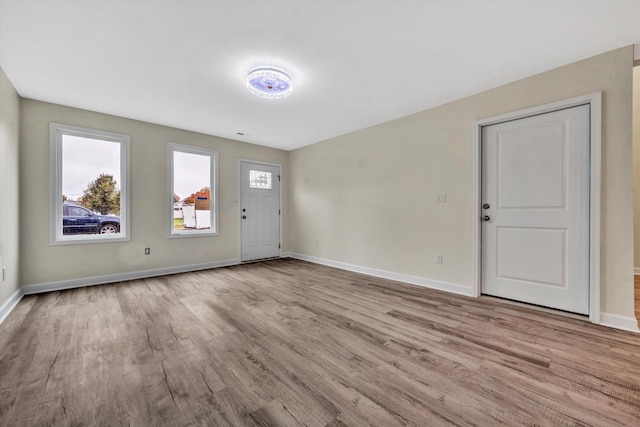 entrance foyer with light wood-type flooring