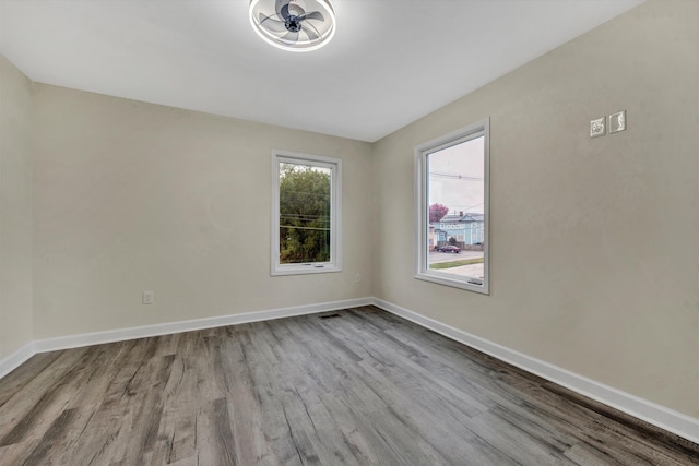 spare room with light wood-type flooring