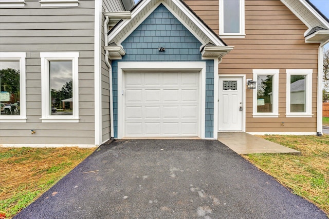 entrance to property with a garage