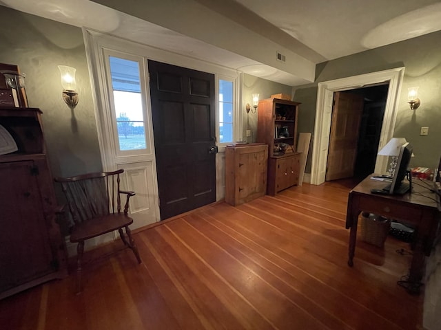 entrance foyer featuring hardwood / wood-style flooring