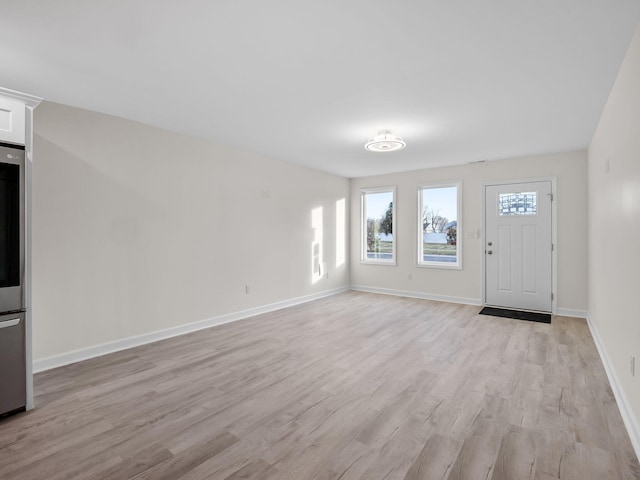 foyer entrance featuring light hardwood / wood-style floors