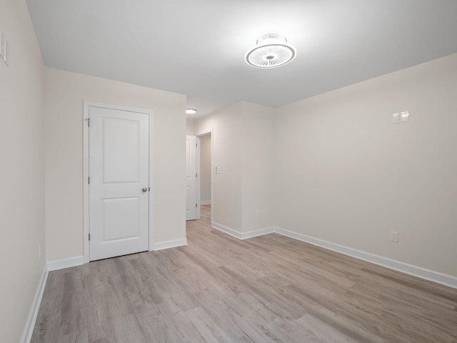 unfurnished bedroom featuring light wood-type flooring