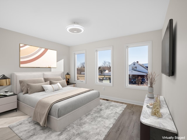 bedroom featuring hardwood / wood-style flooring