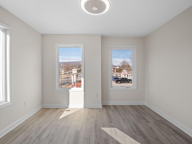 empty room featuring light hardwood / wood-style flooring