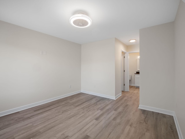 unfurnished room featuring light hardwood / wood-style flooring