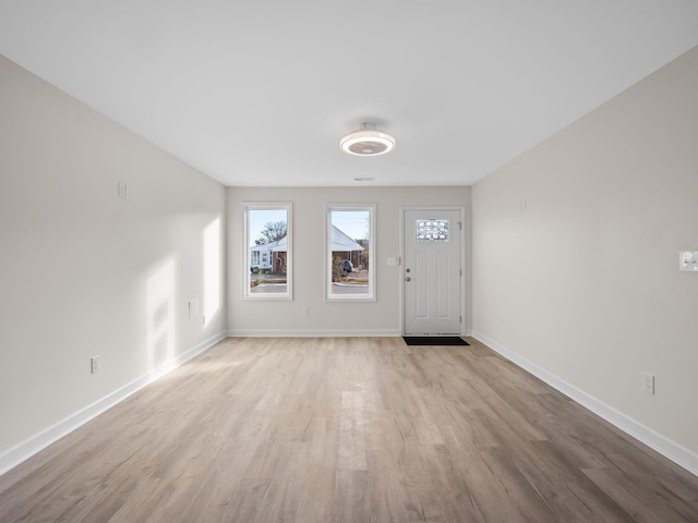 entrance foyer with light hardwood / wood-style floors