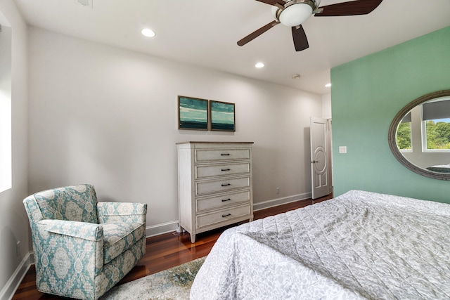 bedroom featuring ceiling fan and dark hardwood / wood-style floors