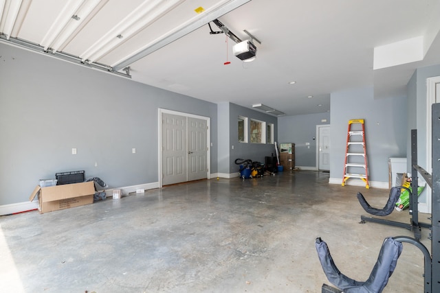 garage featuring a garage door opener