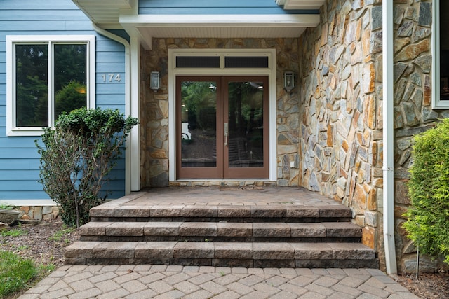 doorway to property with french doors