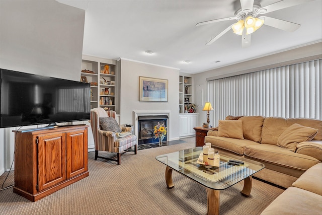 carpeted living room featuring built in features and ceiling fan