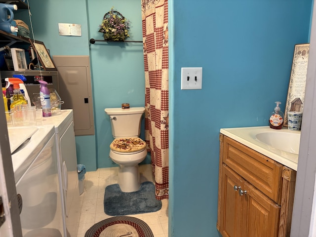 4007 Callaghan Cir, Covington, VA 24426 - bathroom featuring washer and clothes dryer, vanity, toilet, and curtained shower