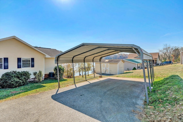 view of parking featuring a carport and a yard