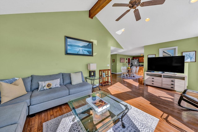 living room with wood-type flooring, ceiling fan, and beamed ceiling