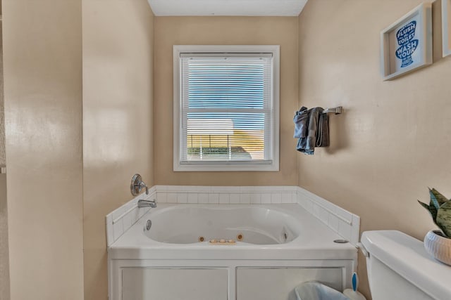 bathroom with a bathing tub and toilet