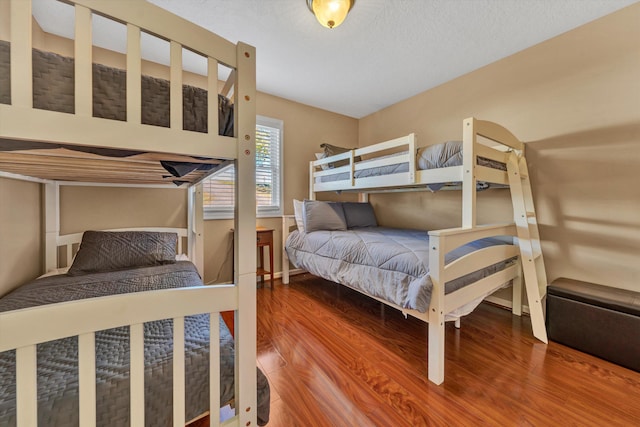 bedroom featuring hardwood / wood-style floors