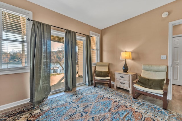 sitting room with light hardwood / wood-style flooring