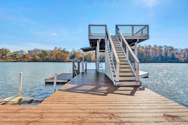 dock area with a water view