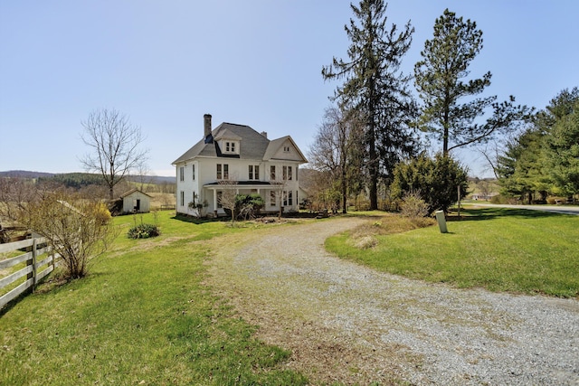 view of front of house with a front lawn