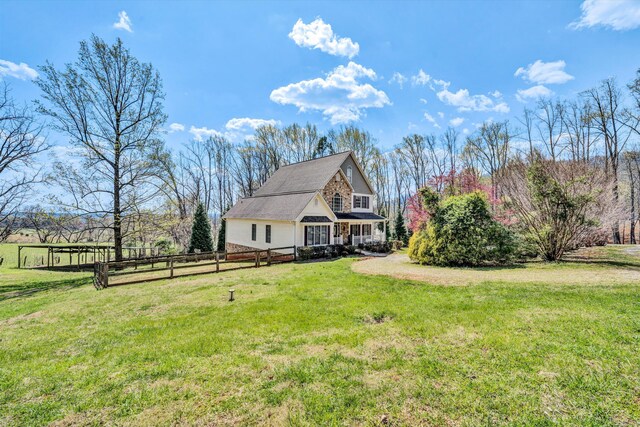 view of front of property with a front yard