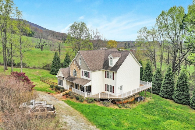 birds eye view of property featuring a mountain view