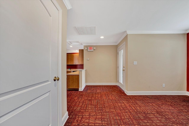 hall featuring crown molding