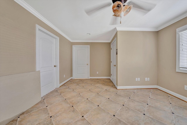 spare room featuring light tile floors, crown molding, and ceiling fan