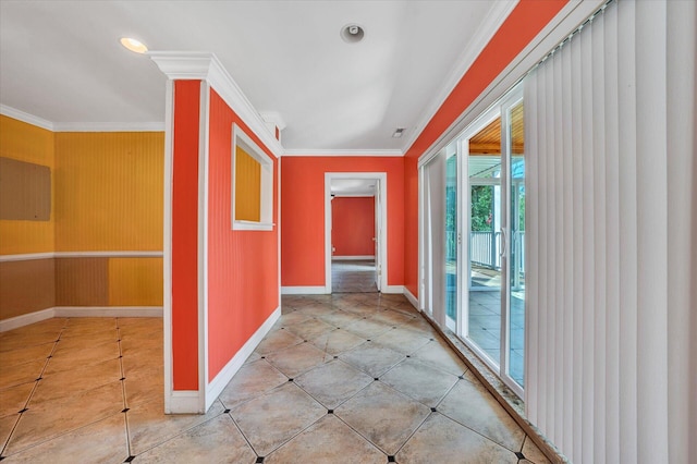 corridor with ornamental molding and light tile floors