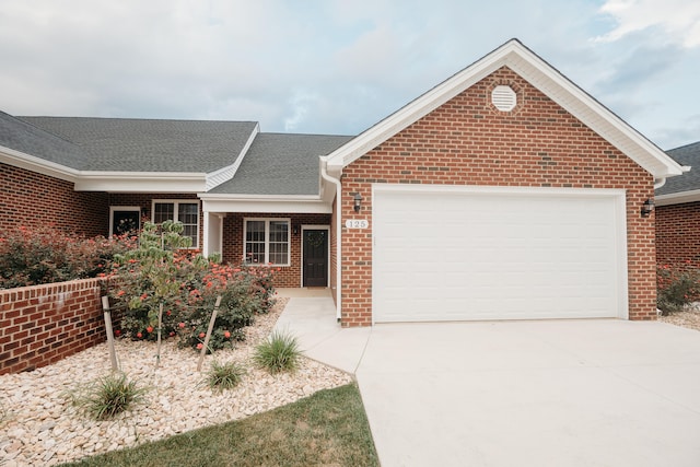 single story home with a garage