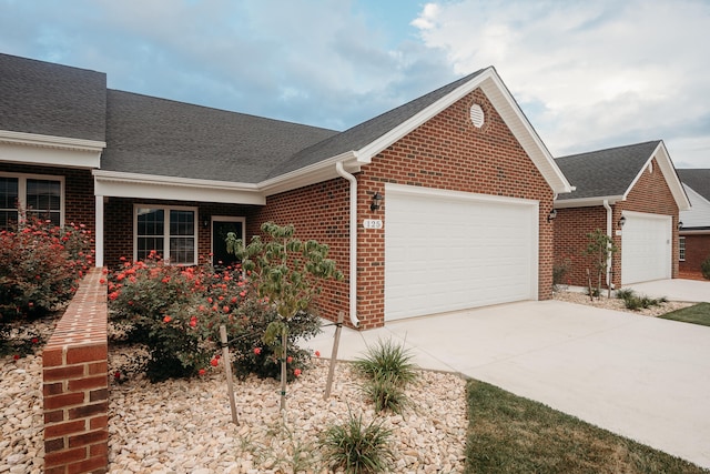 single story home with a garage