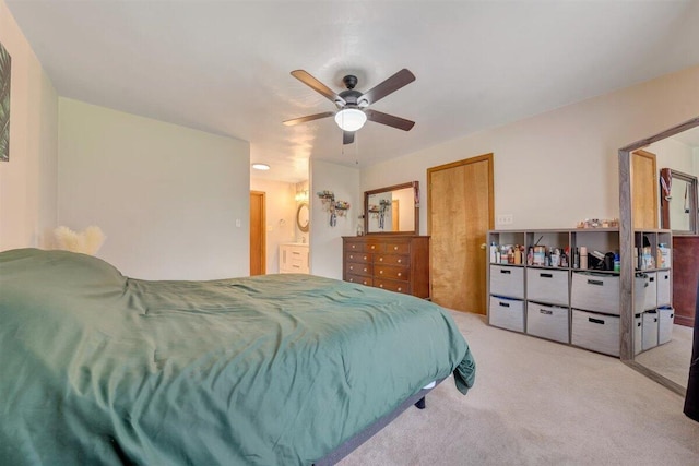 bedroom featuring light carpet and ceiling fan