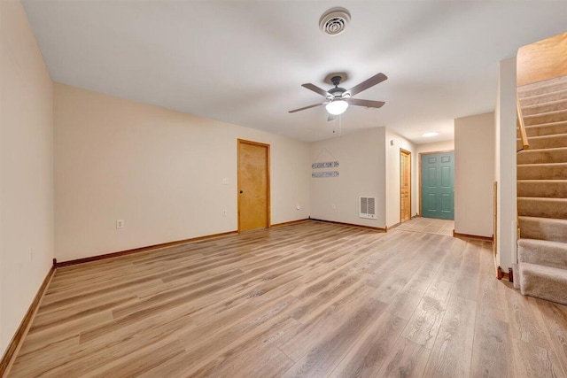 unfurnished room featuring ceiling fan and light hardwood / wood-style flooring