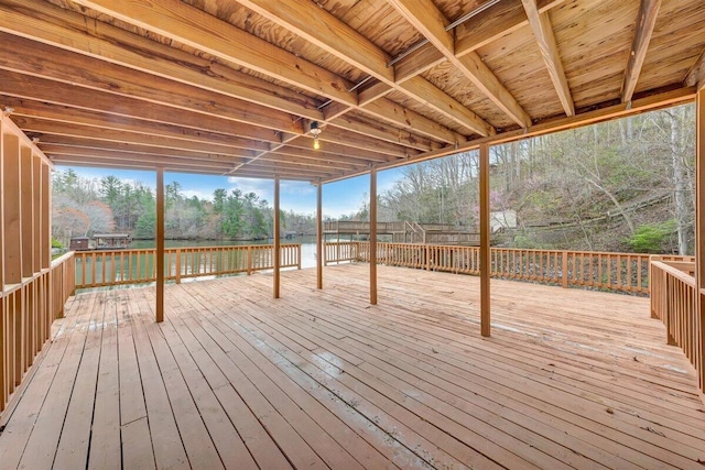 wooden terrace with a water view