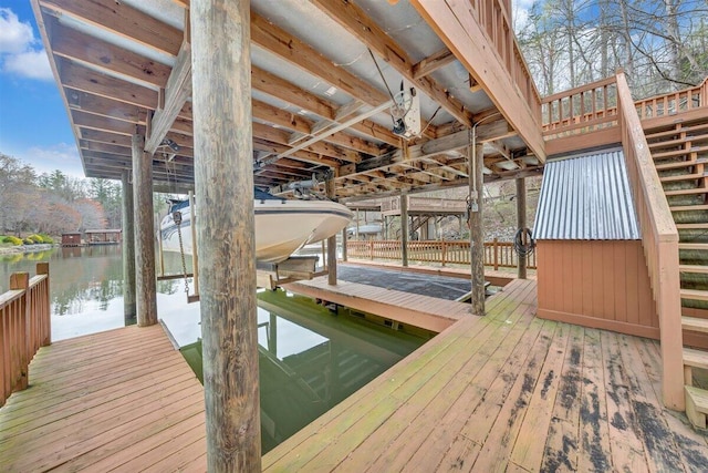 dock area with a water view