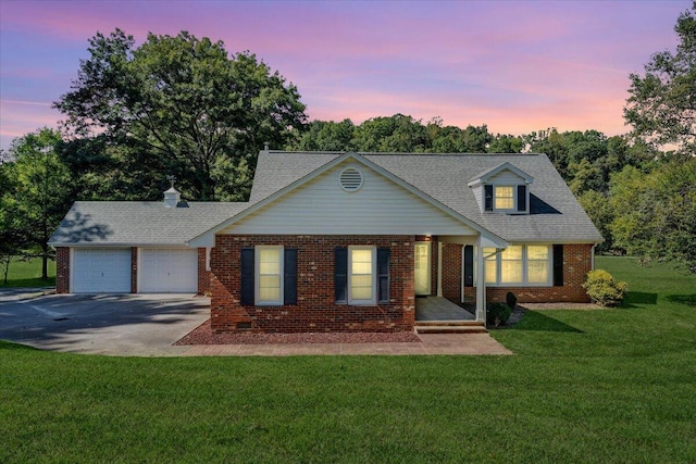 1042 Old Sessler Mill Rd, Troutville, VA 24175 - view of front of home with a garage, a lawn, brick siding, a shingled roof, and driveway