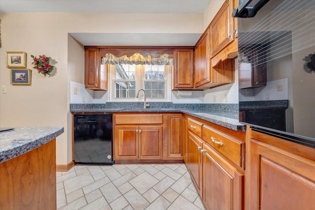 kitchen with light tile patterned flooring, dishwasher, and sink