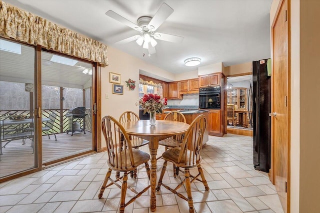 dining area featuring ceiling fan