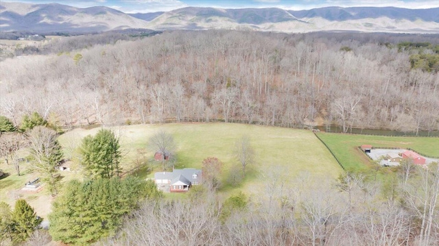 drone / aerial view with a mountain view and a rural view