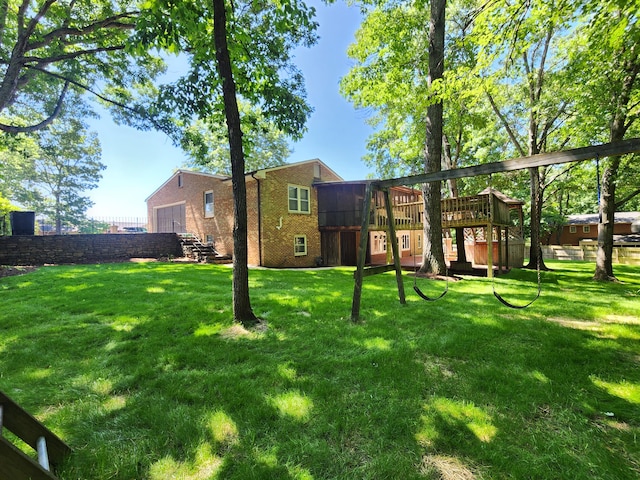 view of yard with a wooden deck