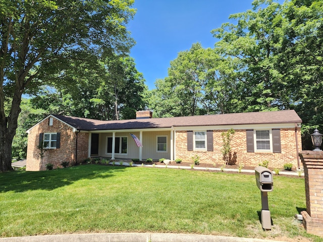 single story home with a front yard