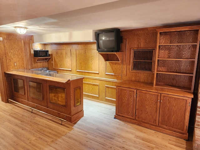 kitchen with light hardwood / wood-style flooring