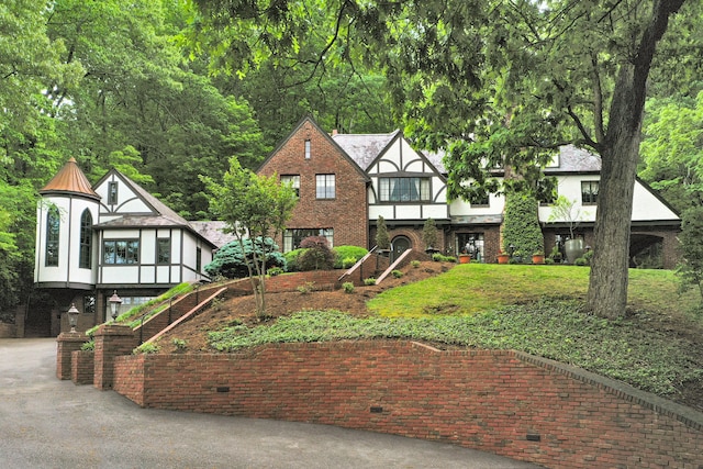 view of tudor-style house