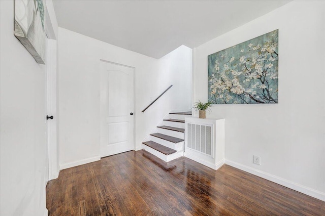 entrance foyer with hardwood / wood-style floors