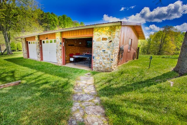 view of outdoor structure featuring a yard