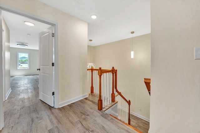 corridor featuring light hardwood / wood-style floors