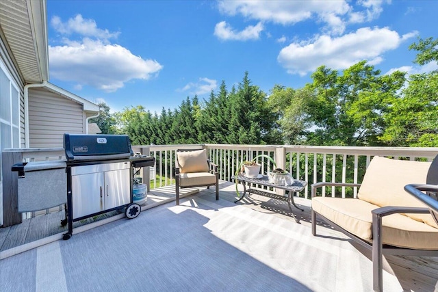 wooden deck with grilling area