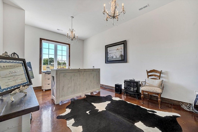 office area with a notable chandelier