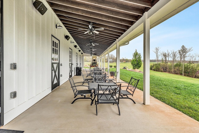 view of patio / terrace featuring ceiling fan