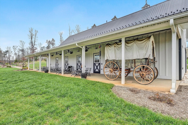 back of house with a yard